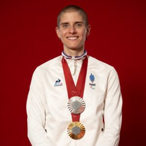 Marie Patouillet posing with some of her medals. Picture: CPFS/KMSP